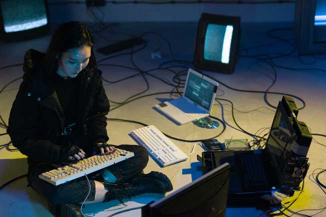 A Woman Typeing on the Keyboard